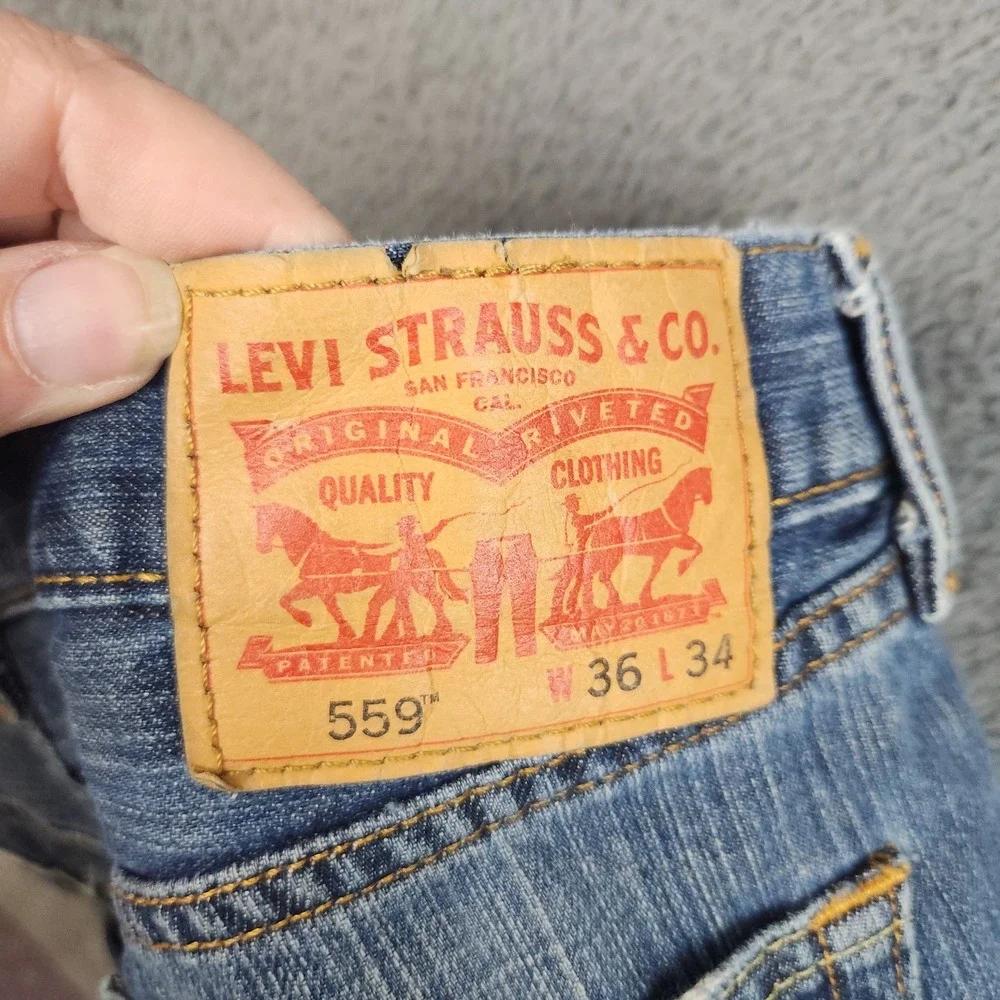 Levi's 559 Relaxed Straight Jeans Mens 36x34 Blue Mid Rise Distressed Denim
